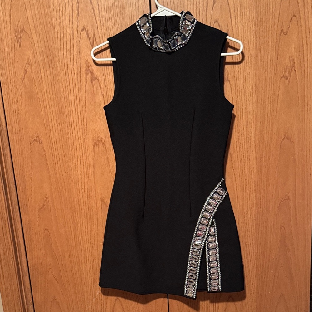 Elegant Black Sleeveless Dress with Embellishments